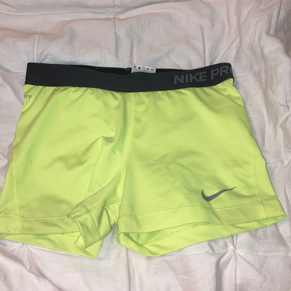 yellow nike pro shorts